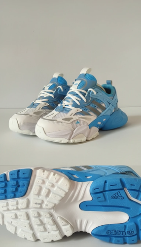 کفش مردانه آدیداس دیلاکس تانک سفید آبی کفش اسپرت مردانه آدیداس دیلاکس تانک نمای جانبی کفش آدیداس تانک سفید آبی جزئیات رنگ کفش آدیداس دیلاکس تانک مردانه زیره کفش آدیداس دیلاکس تانک مردانه