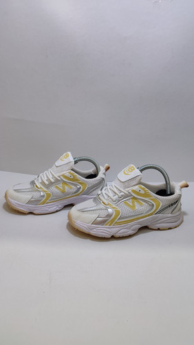 کفش بچگانه نیو بالانس سفید زرد نقرهای