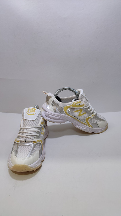 کفش بچگانه نیو بالانس سفید زرد نقرهای