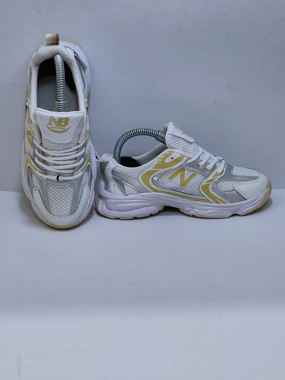 کفش بچگانه نیو بالانس سفید زرد نقرهای